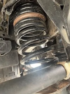 Jeep Gladiator coil touching frame in the rear passenger