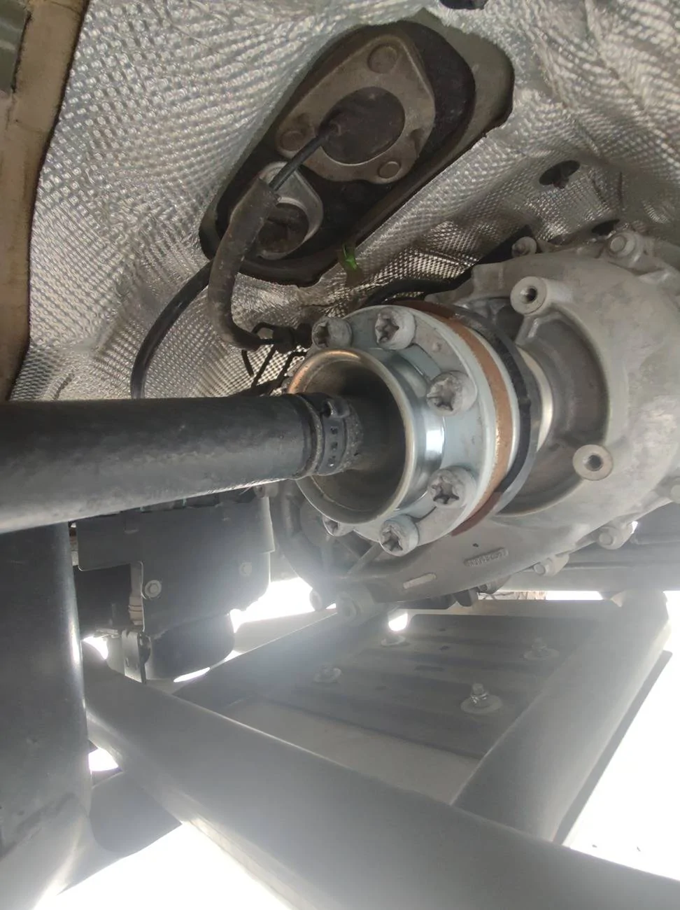 Jeep Gladiator Carrier bearing spacer for rear driveshaft IMG_20250430_112036861