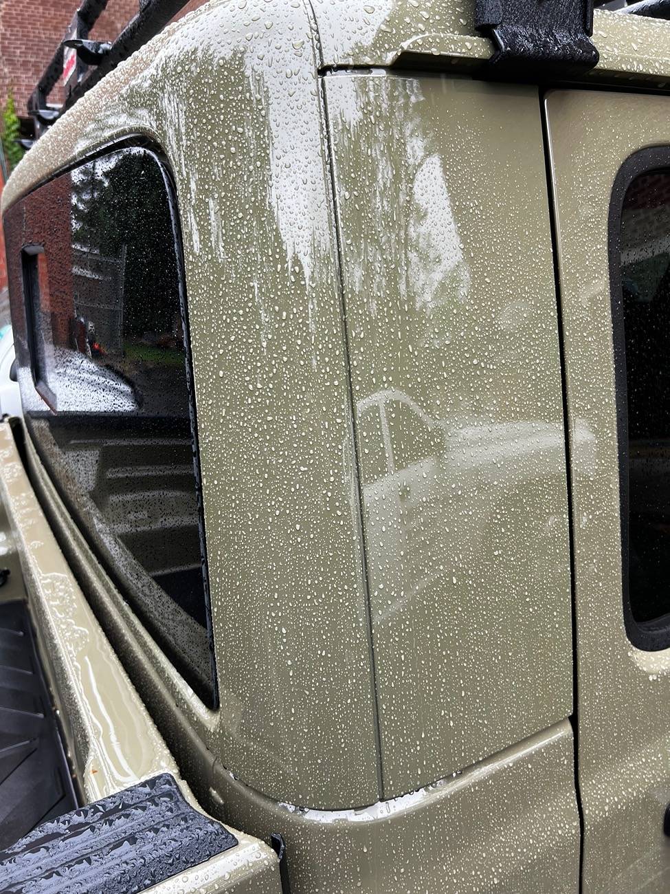 Jeep Gladiator Giving my new truck it's first good wash and noticed this... WTF? IMG_5486