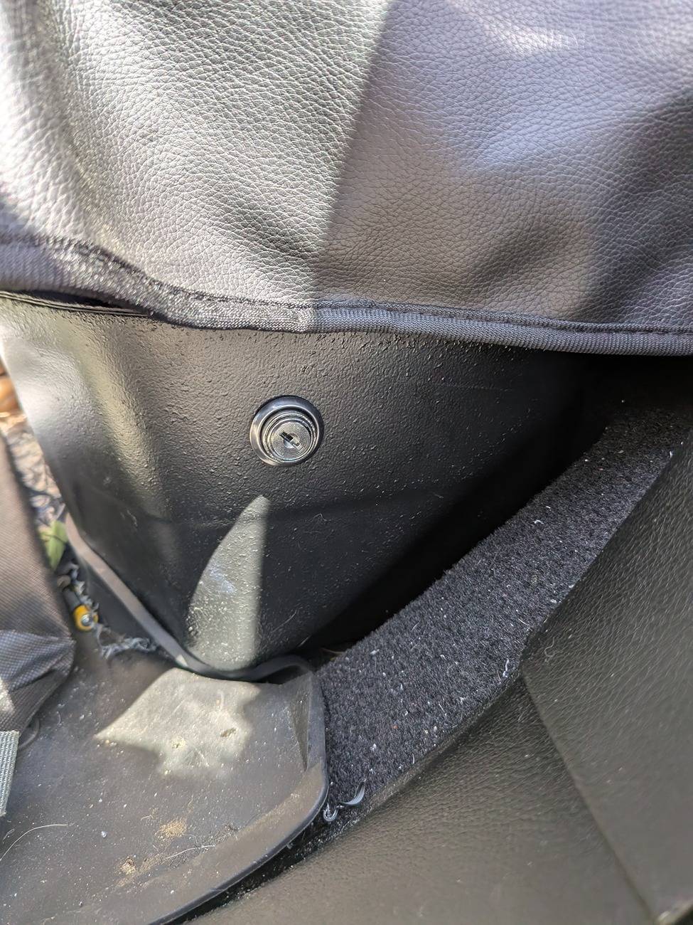 Jeep Gladiator Locking Storage under the rear seats with base plastic divider. Less than $20 PXL_20250603_184928182