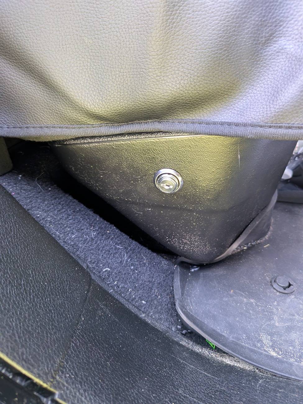 Jeep Gladiator Locking Storage under the rear seats with base plastic divider. Less than $20 PXL_20250603_184903551
