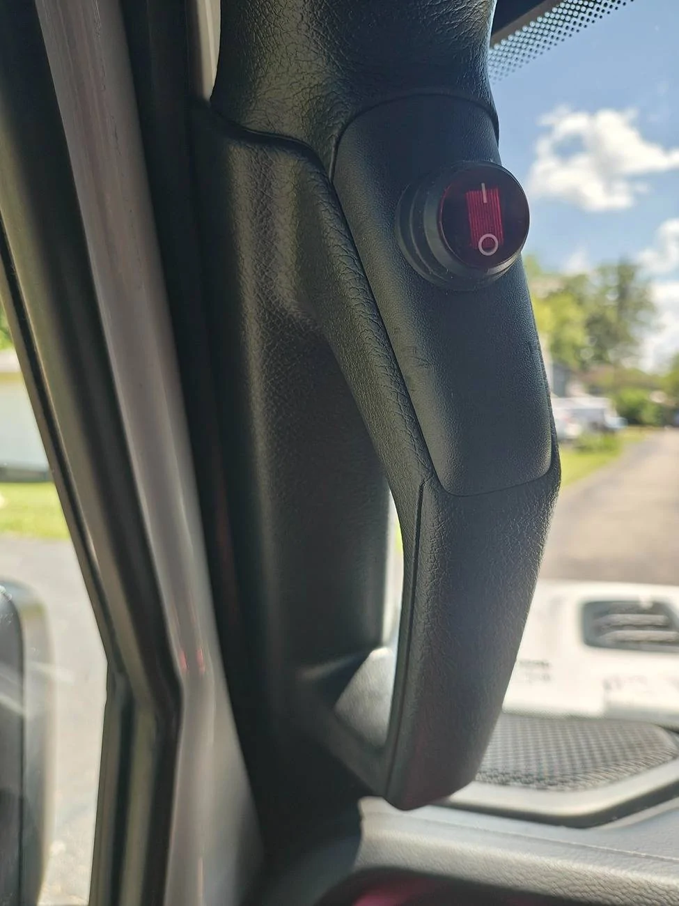 Jeep Gladiator Ever wondered where to mount a lightbar switch when you don't have auxiliary switches under the radio? grab-bar switch