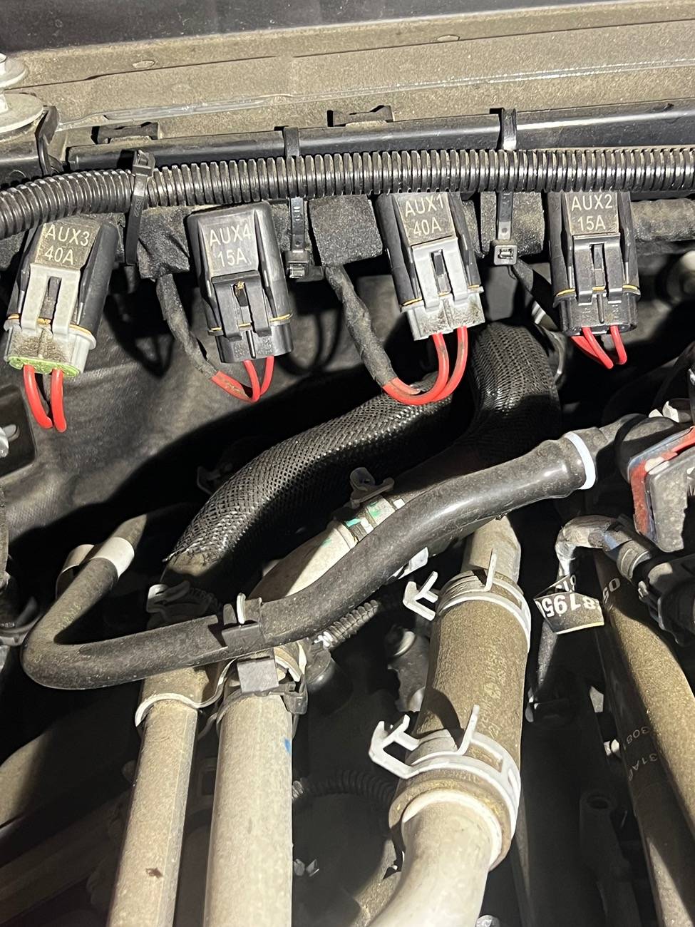 Jeep Gladiator Is it possible to wire this harness to one of the AUX switches? IMG_3221