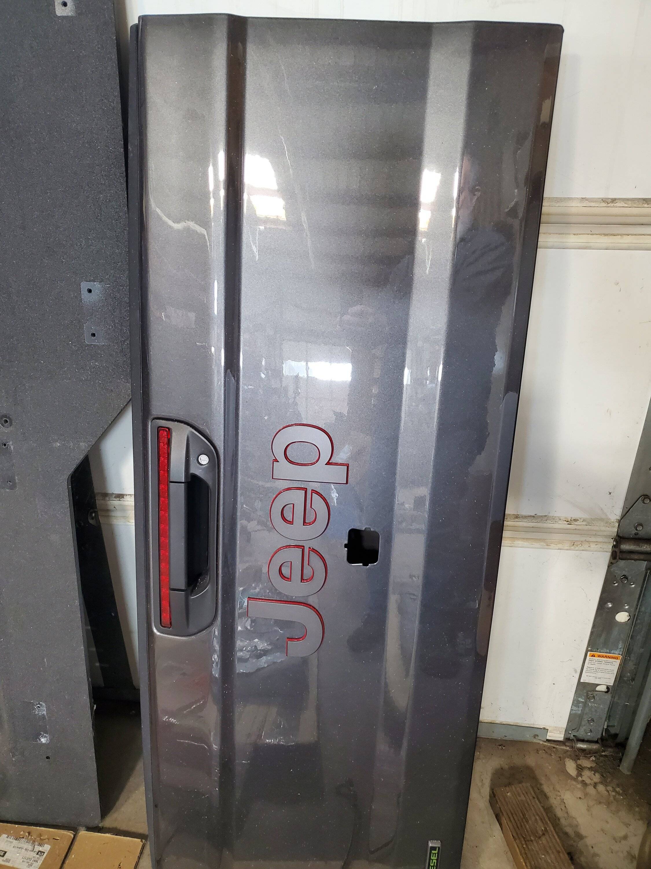 Jeep Gladiator Leather Seats rear storahe bin, Tailgate Clayton springs 20250203_105208