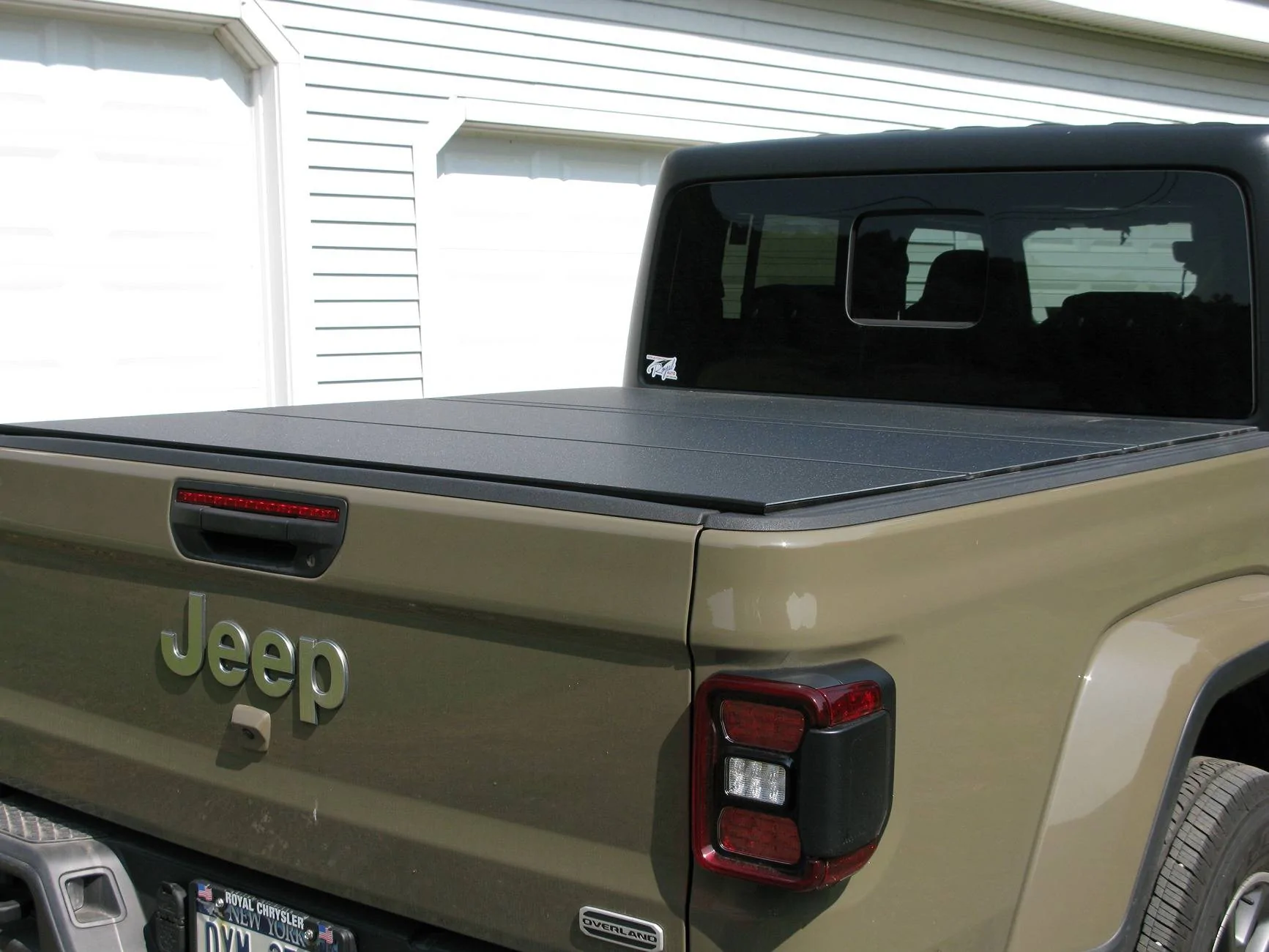 Jeep Gladiator Anyone have recommendations on a decent quality water-resistant bed cover/tonneau? IMG_1413