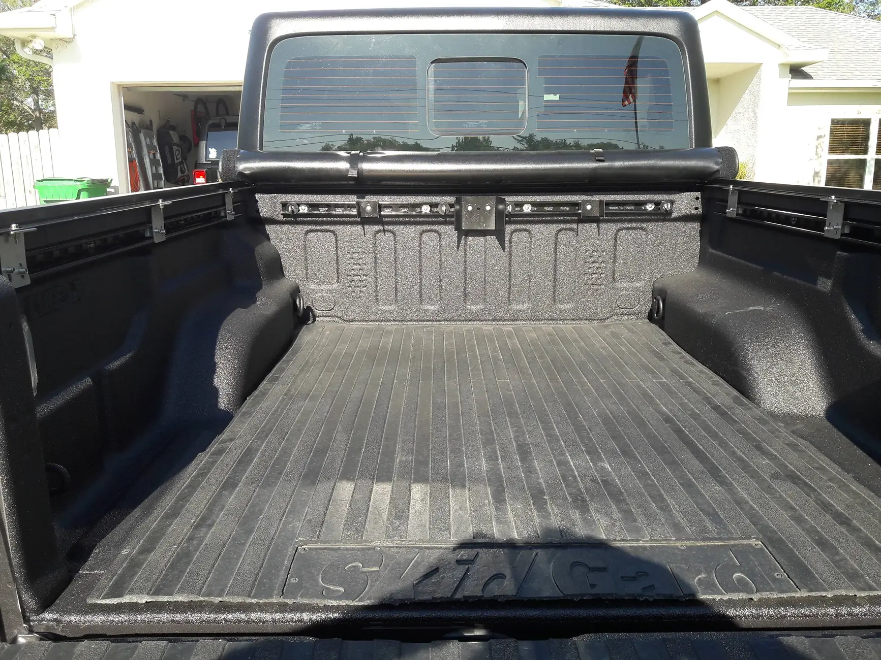 Jeep Gladiator No-drill options for motorcycle front wheel chock mounted in bed? 1755169846216-y2