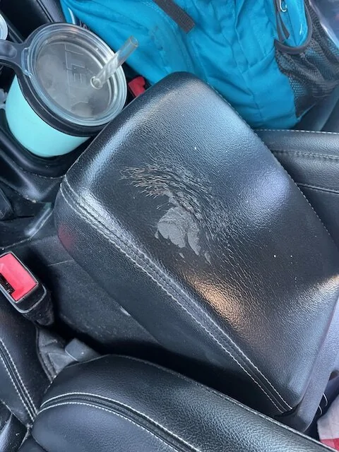 Jeep Gladiator Leather armrest looks like alien acid destroyed it :) IMG_4550