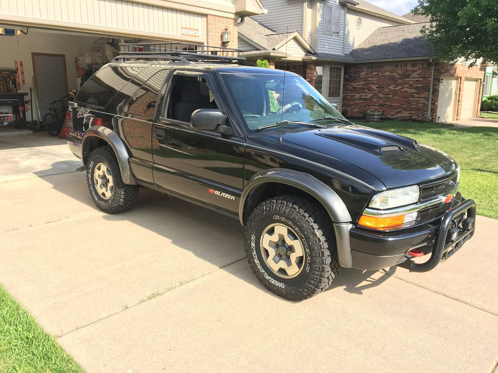 Jeep Gladiator Sons first vehicle purchased on his own 2005 ZR2 Blazer