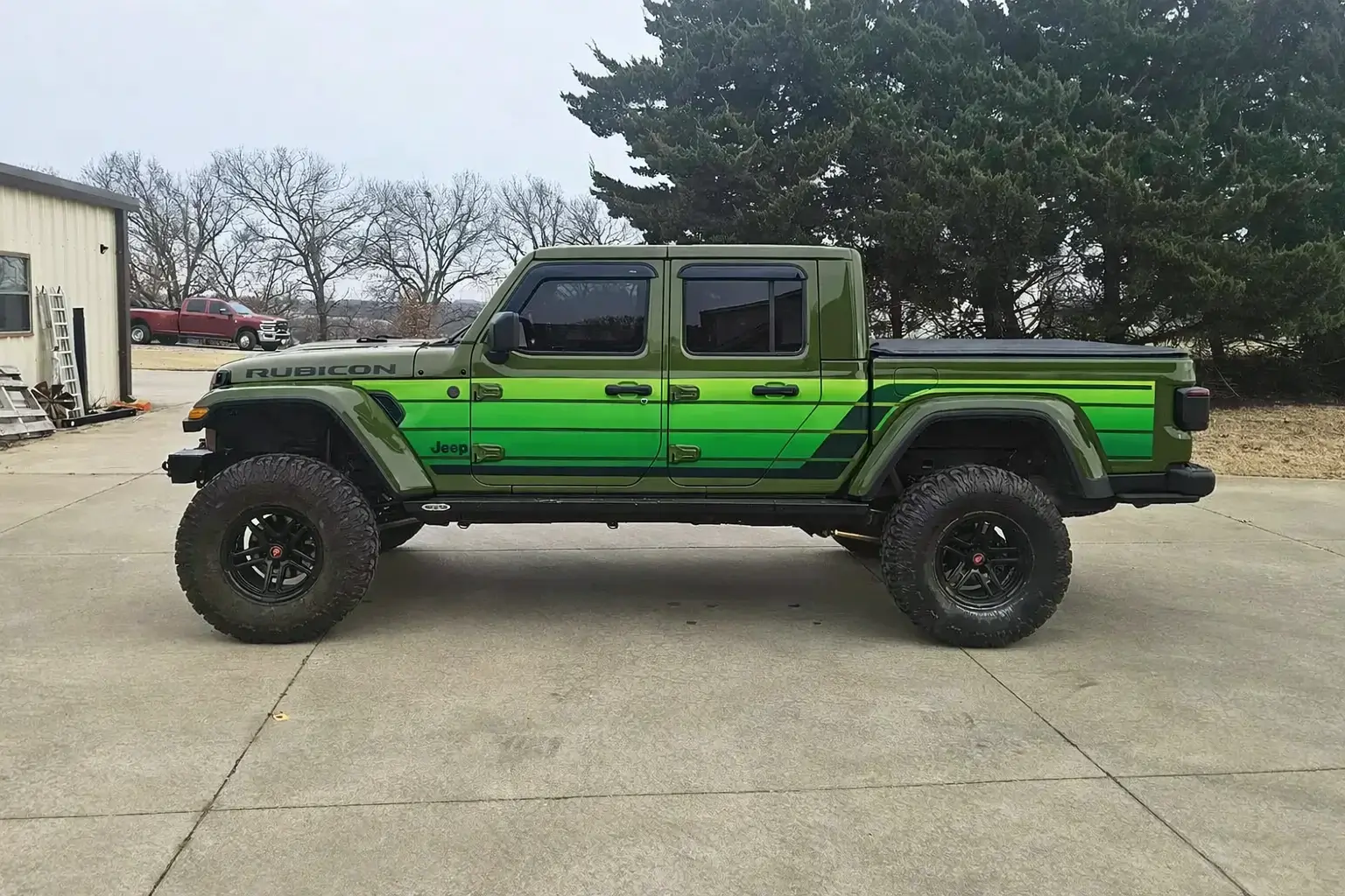 Jeep Gladiator Got it on the road with old school wrap, 3.5" lift and 37s. All I lack is finishing ChatGPT Image Jan 4, 2026, 09_46_53 PM