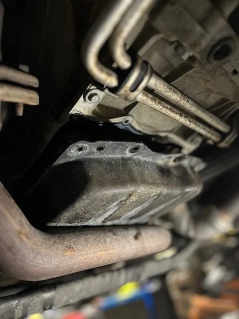 Jeep Gladiator Pan Drop / Drain & Fill Instructions for ZF 8HP50 or Chrysler TorqueFlite 850RE Automatic Transmission pan_drop_090_detached_MOPAR_transmission_oil_pan_&_gasket_(MOPAR_68522534AA)_before_being_com