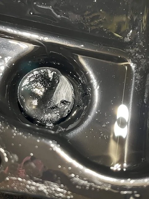 Jeep Gladiator Pan Drop / Drain & Fill Instructions for ZF 8HP50 or Chrysler TorqueFlite 850RE Automatic Transmission pan_drop_120_metallic_sludge_accumulated_on_1_of_2_transmission_magnets_(MOPAR_68207788AA)_cr