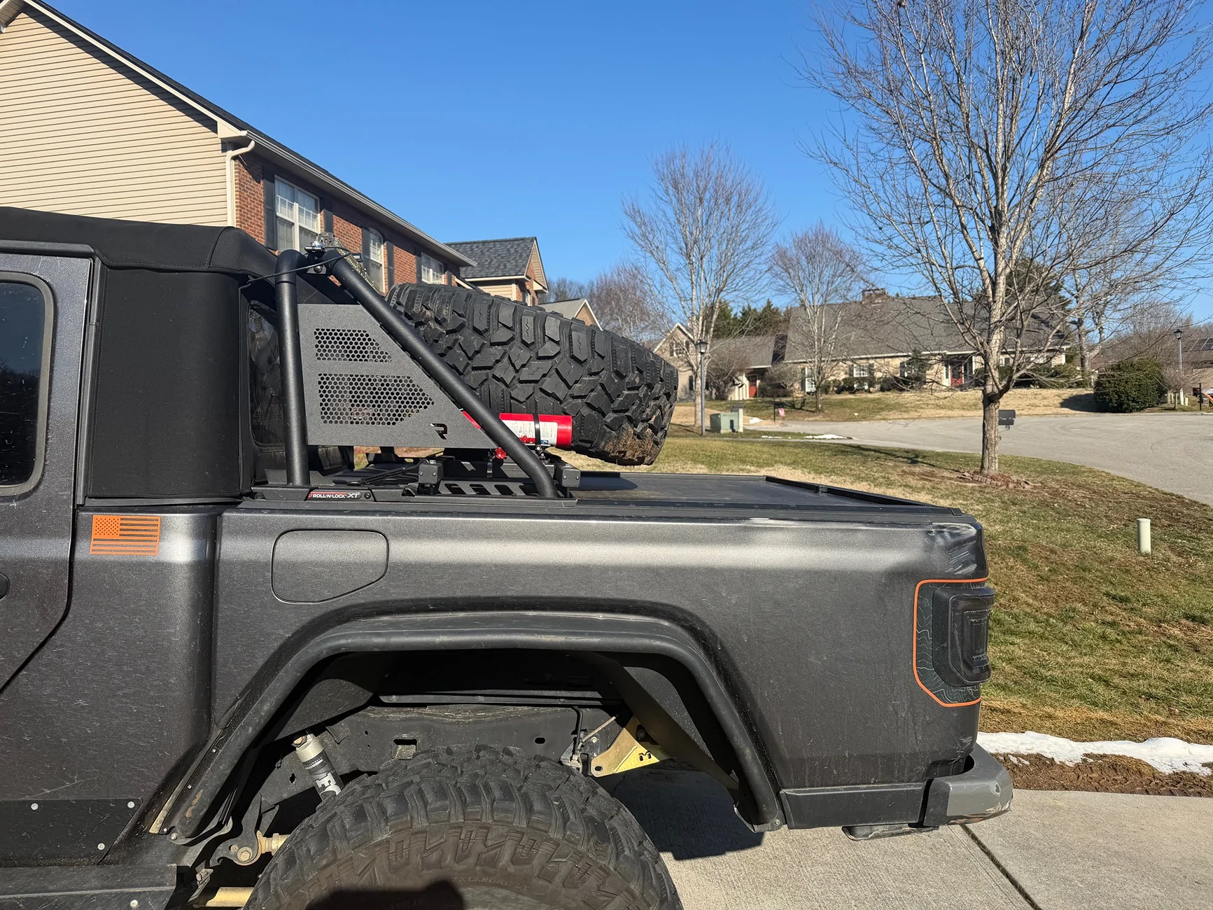 Jeep Gladiator Roll n lock bed cover with n fab rack and tire carrier IMG_0339