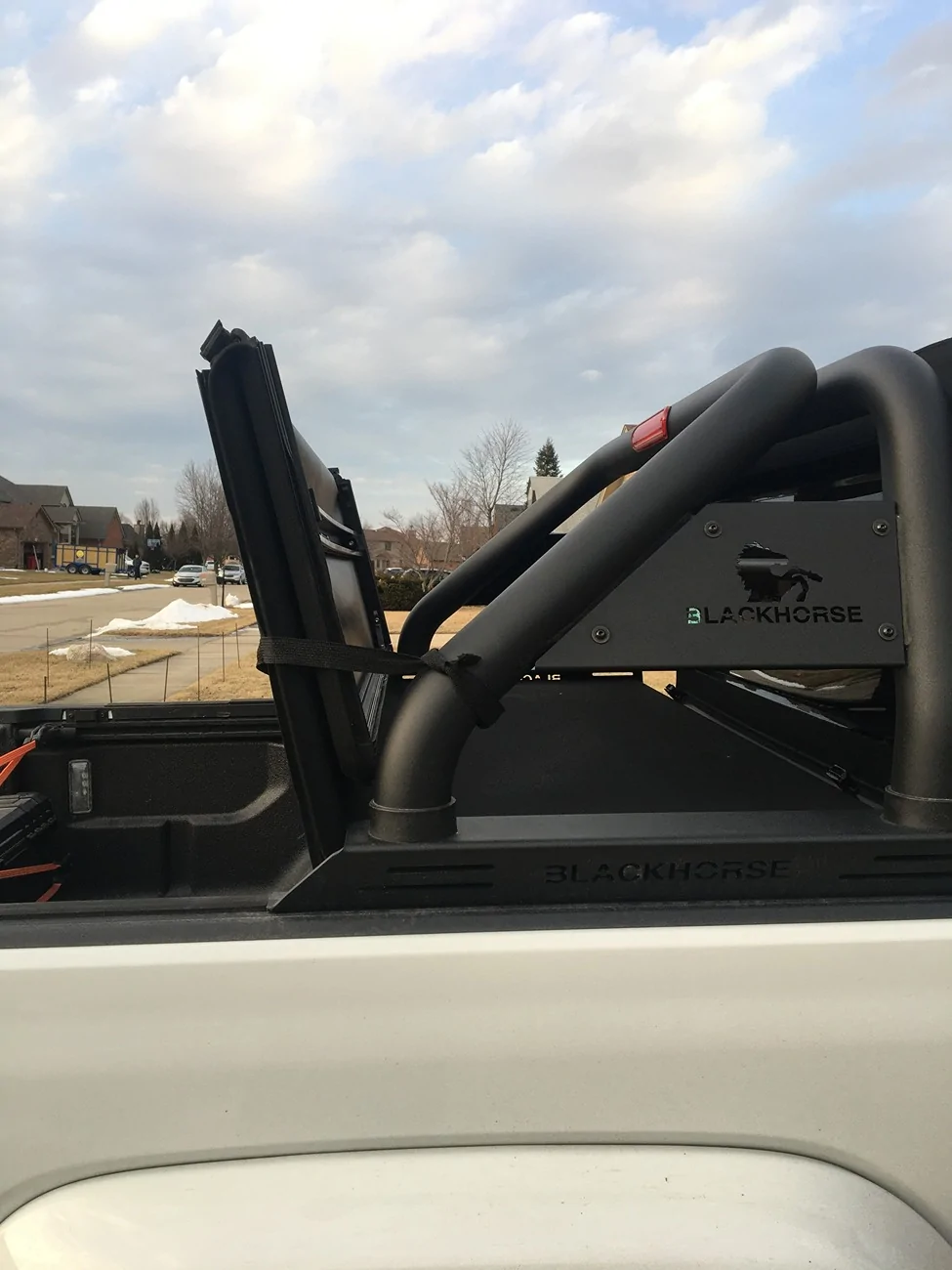 Tonneau cover folded up 2.webp