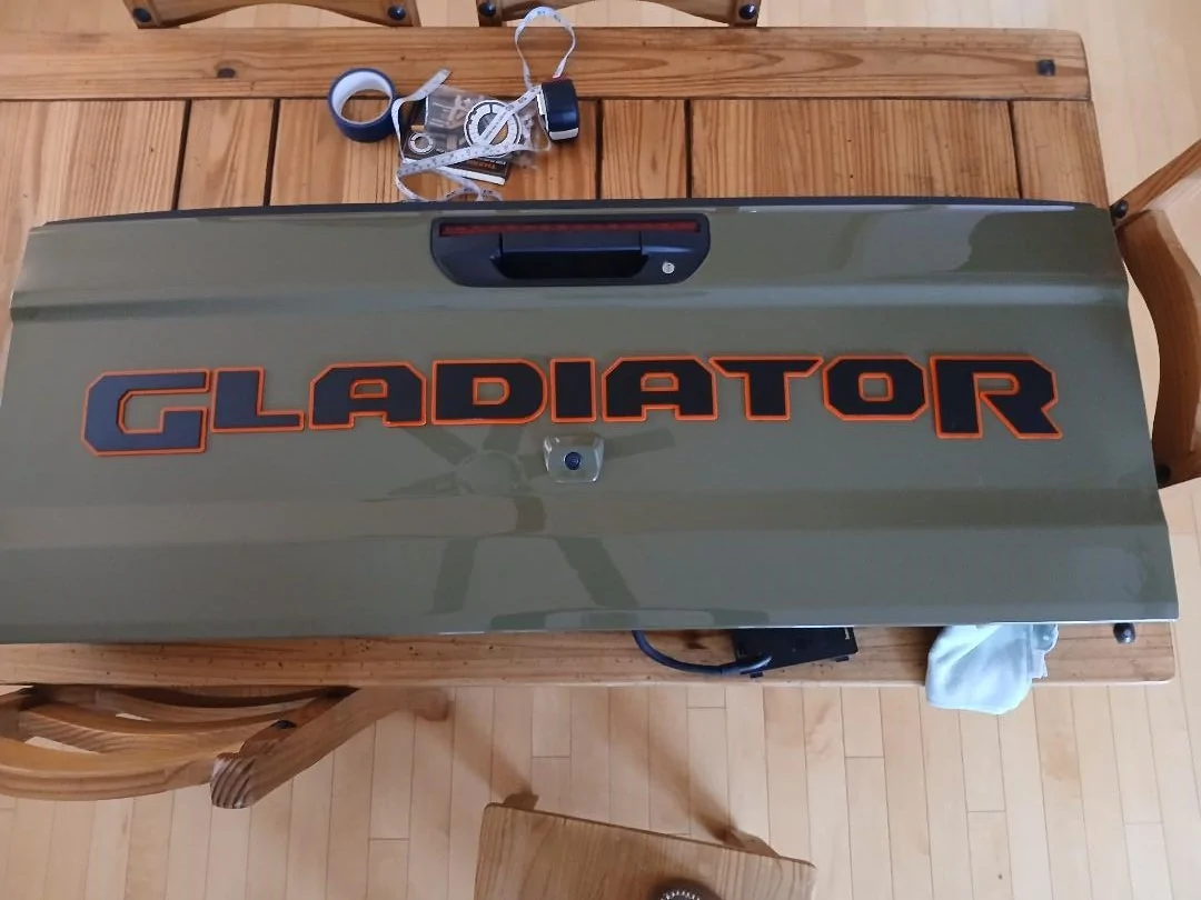 Jeep Gladiator 2025 Mojave X Tailgate in #41 with "GLADIATOR" for trade for stock unit 1 (2)