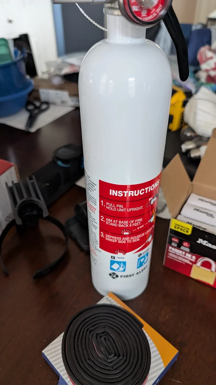 Jeep Gladiator Mounting a fire extinguisher to the C-pillar ExtinguisherAndRubberStripping