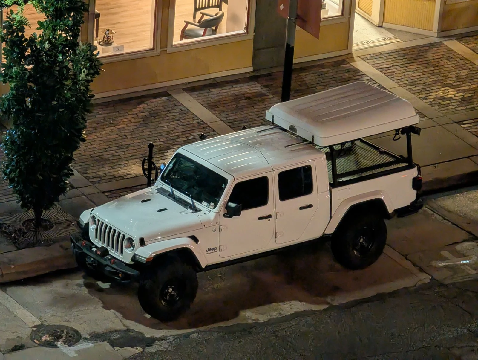 Jeep Gladiator Very dumb question: What are those little black things on the Sport hood called? 1000015788