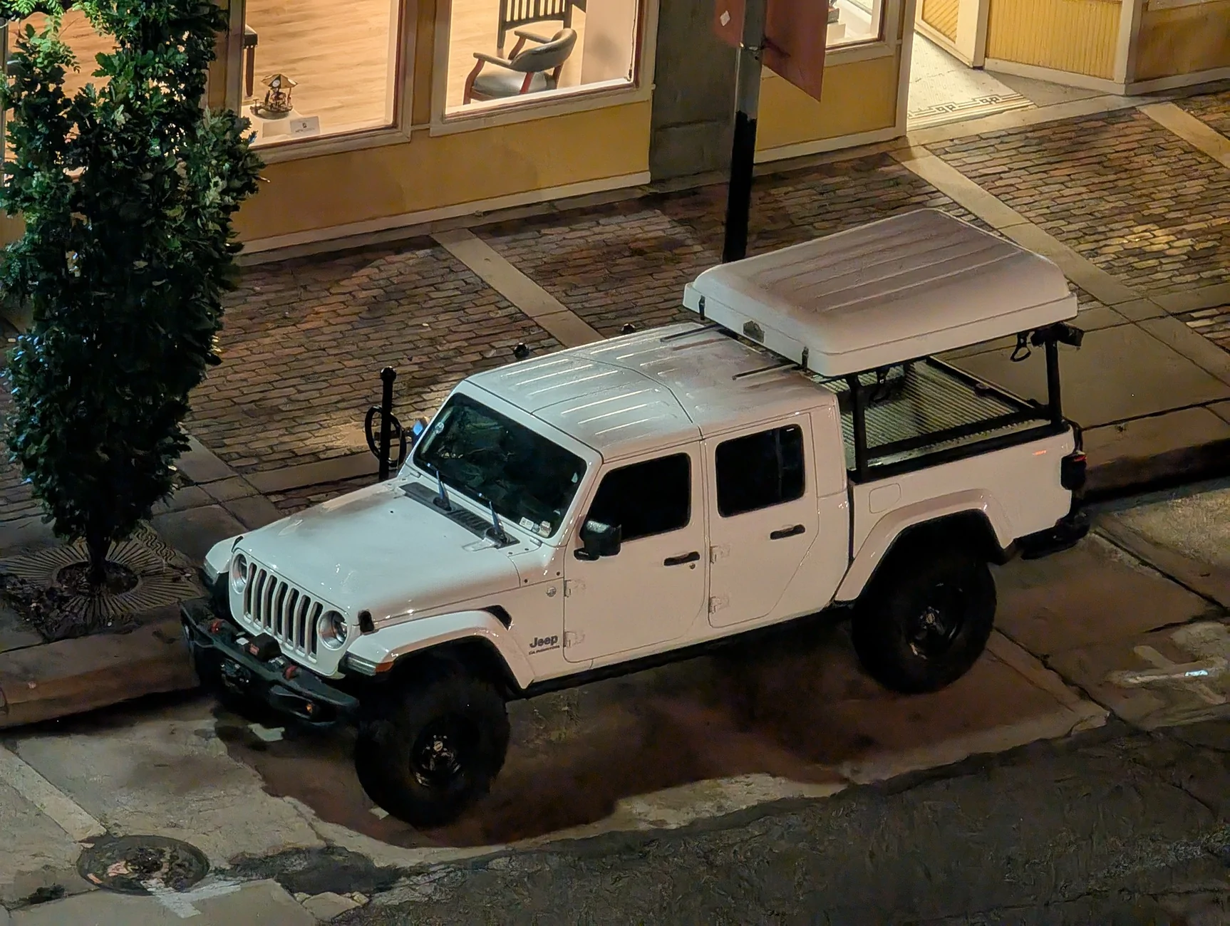 Jeep Gladiator Very dumb question: What are those little black things on the Sport hood called? 1000015786