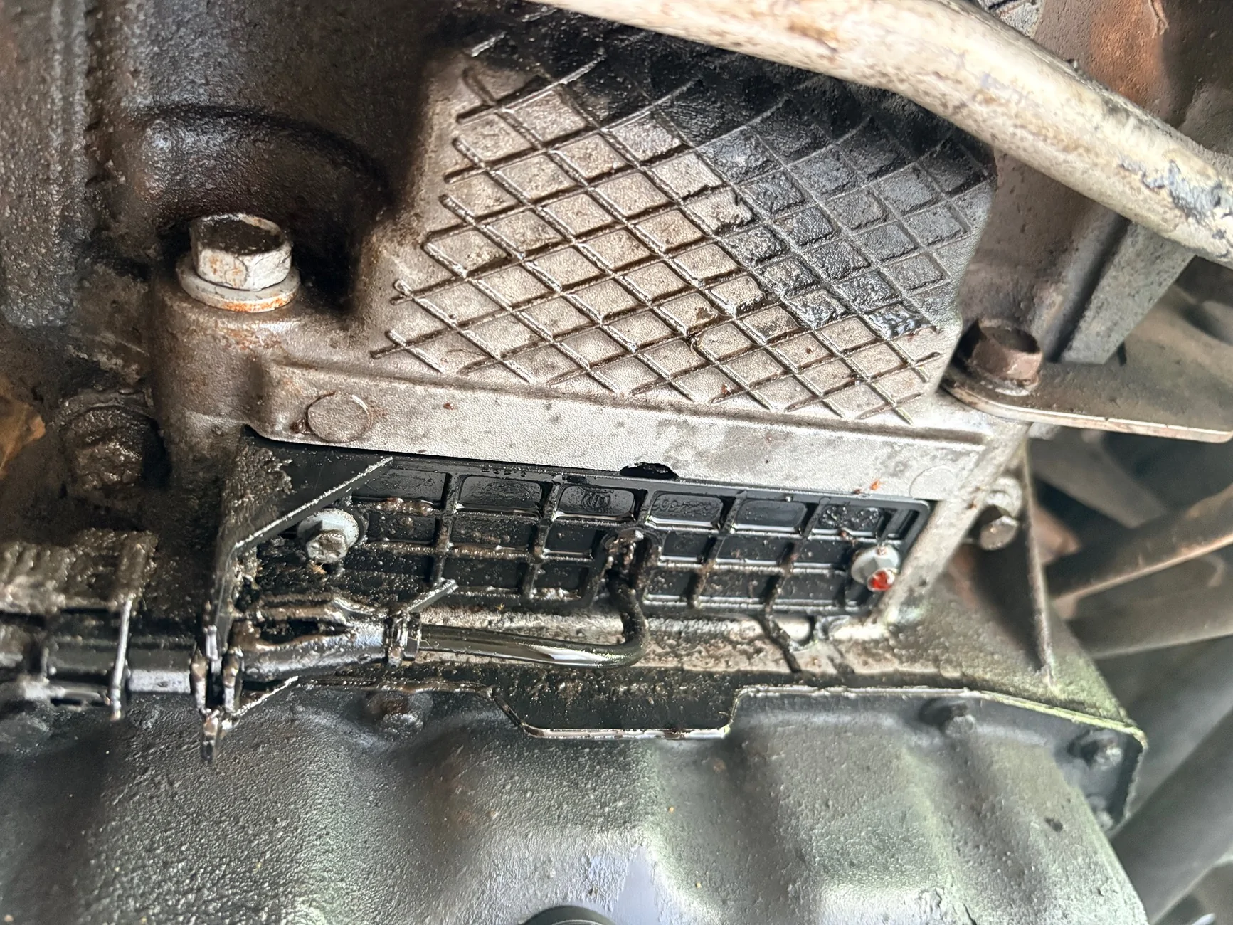 Jeep Gladiator Transmission Leak in front of trans, anyone figure out what it is? IMG_4261