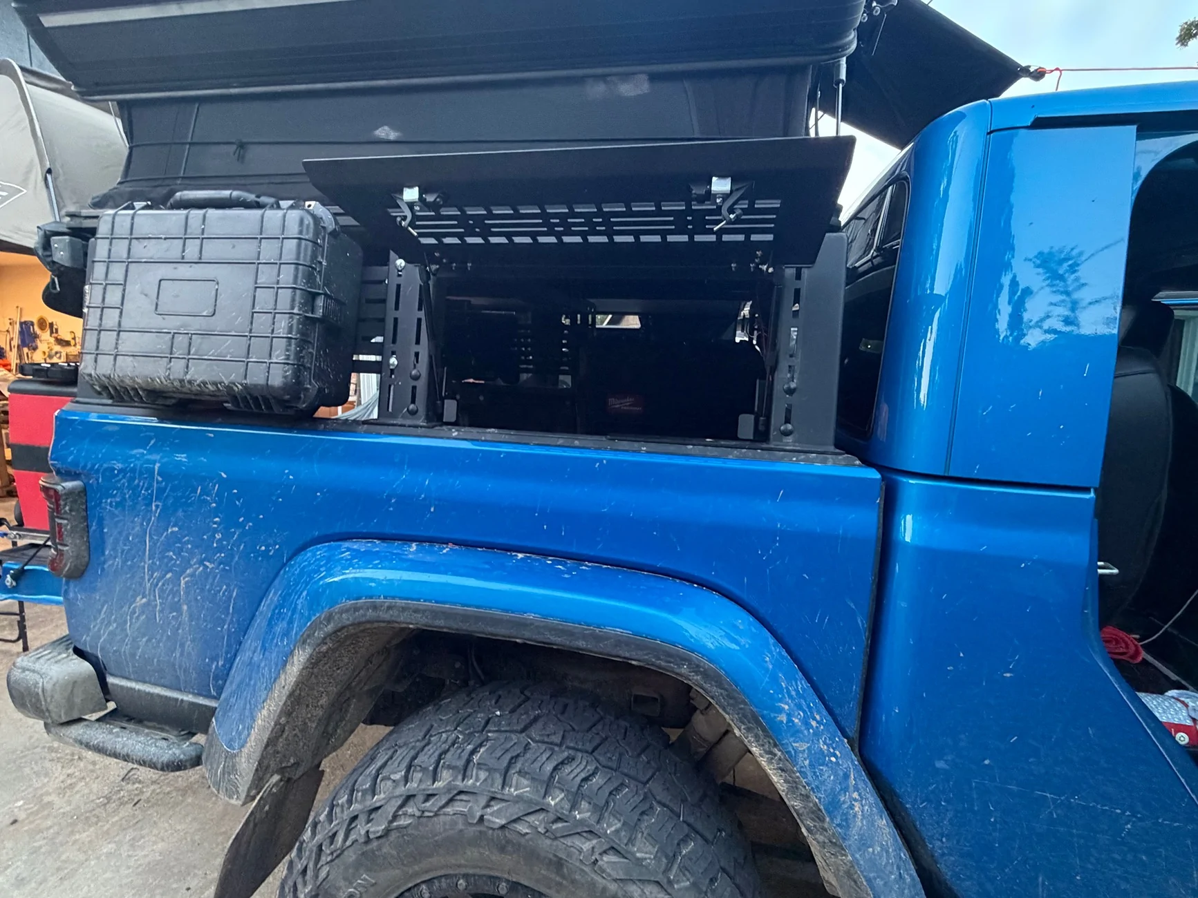 Jeep Gladiator Who has a rebel offroad rack with the side opening hatches? IMG_0883