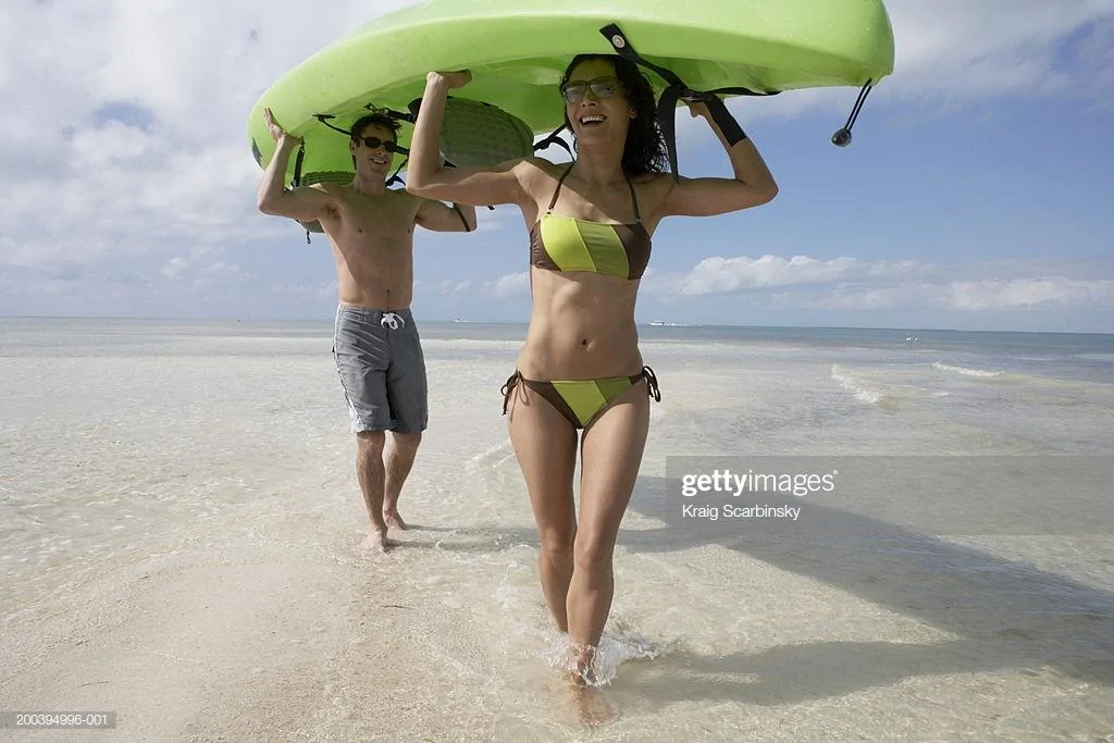 Jeep Gladiator Tops! Canopy / covers / toppers / racks possibilities for Gladiator - Show me! young-couple-carrying-canoe-over-heads-on-beach-smiling-picture-id200394996-001