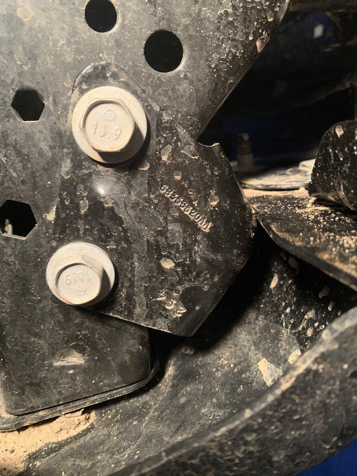 Jeep Gladiator Installing Stock Rubicon Skid Plate on Sport LeftWith