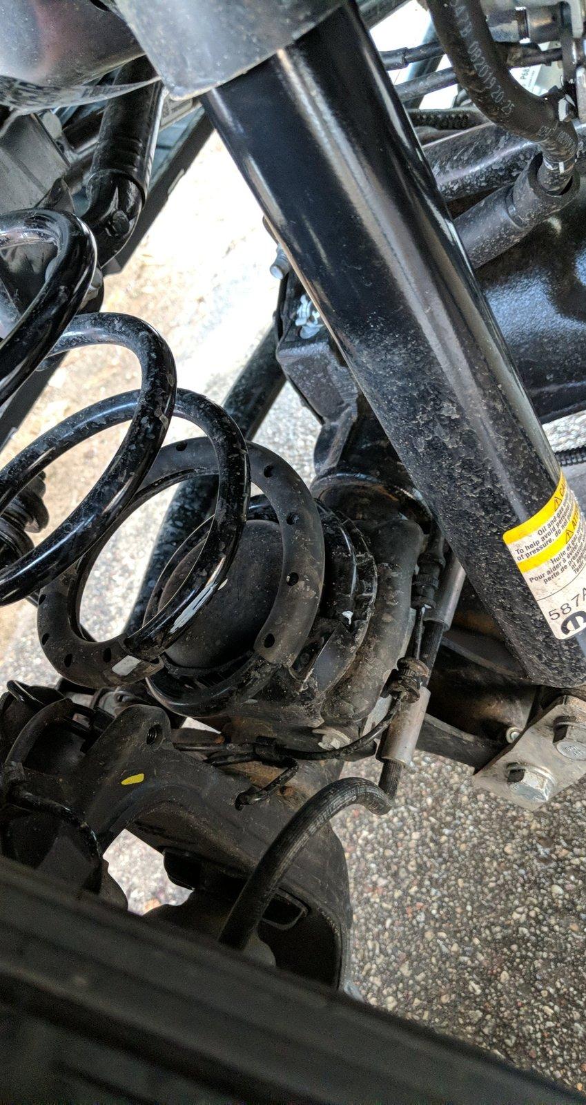 Jeep Gladiator Front coil spring bending after Daystar leveling kit. Snapchat-392740390