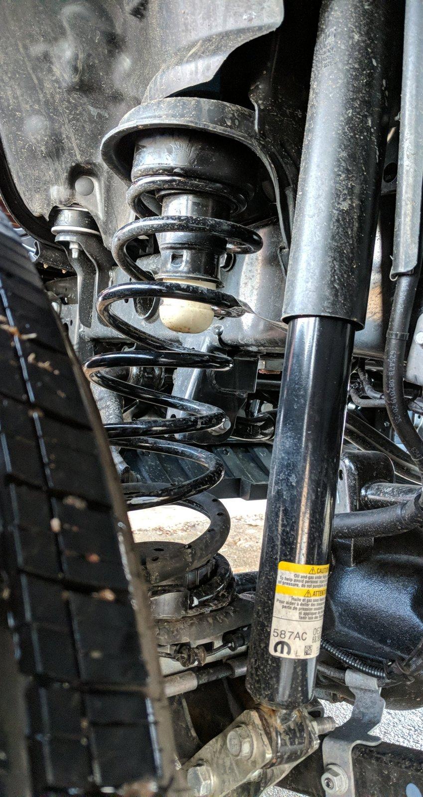 Jeep Gladiator Front coil spring bending after Daystar leveling kit. Snapchat-1810859132
