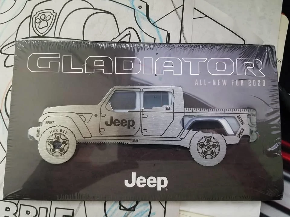 Jeep Gladiator Gladiator brochure with multi-tool 50333836_1965225700439705_8098795662839119872_n