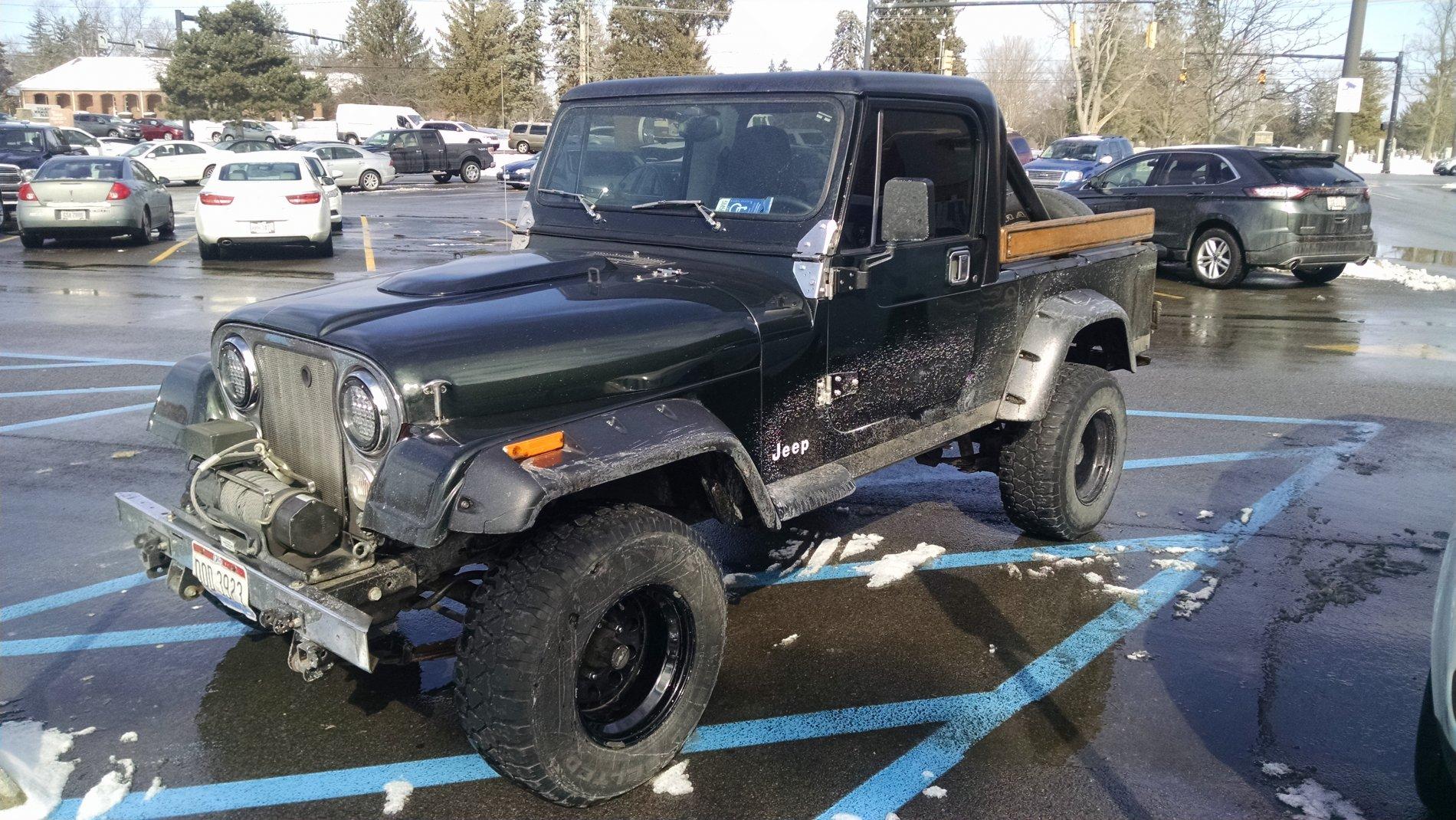 Jeep Gladiator Old Jeep truck with new Jeep truck photo.JPG