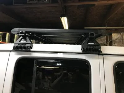 Jeep Gladiator Any good rooftop racks that mount to the BACK of the roof (leave the freedom panels "free"? rack