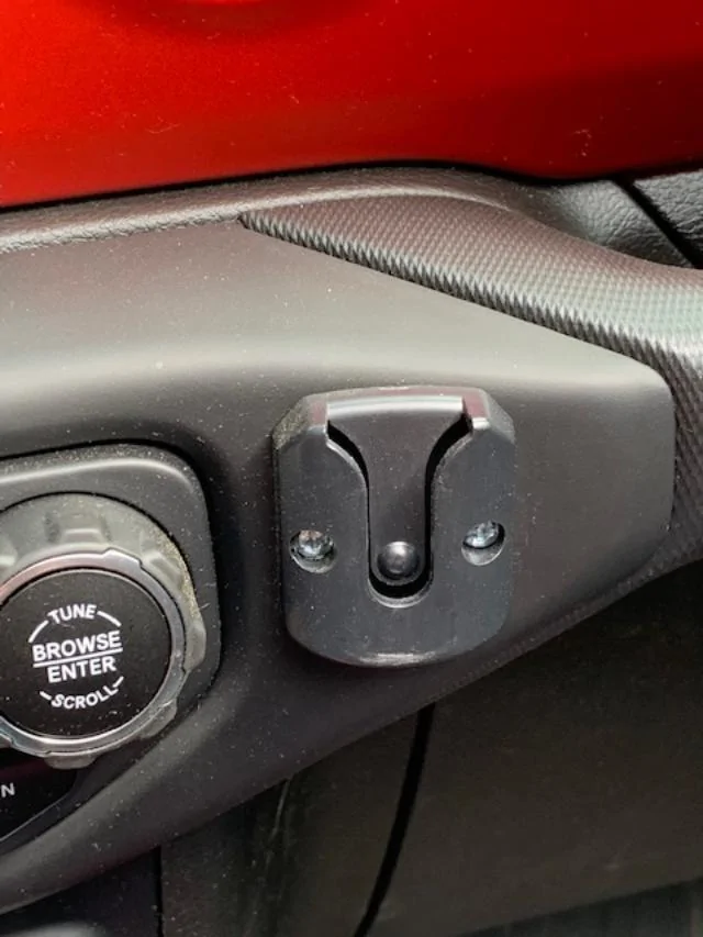 Jeep Gladiator How do I get a CB/HAM microphone mounted here?  Has anyone drilled it? thumbnail