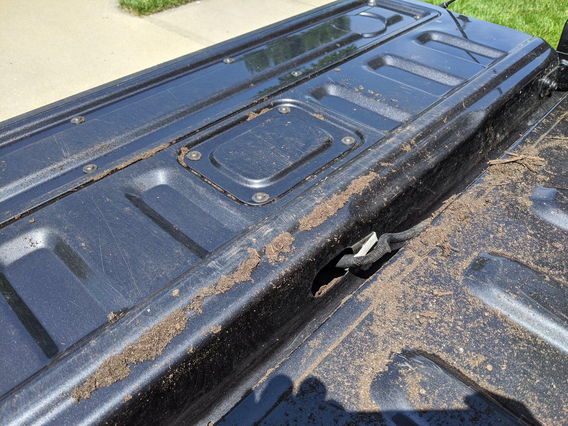 Jeep Gladiator Access hole in tailgate lets in crud IMG_20200613_143357