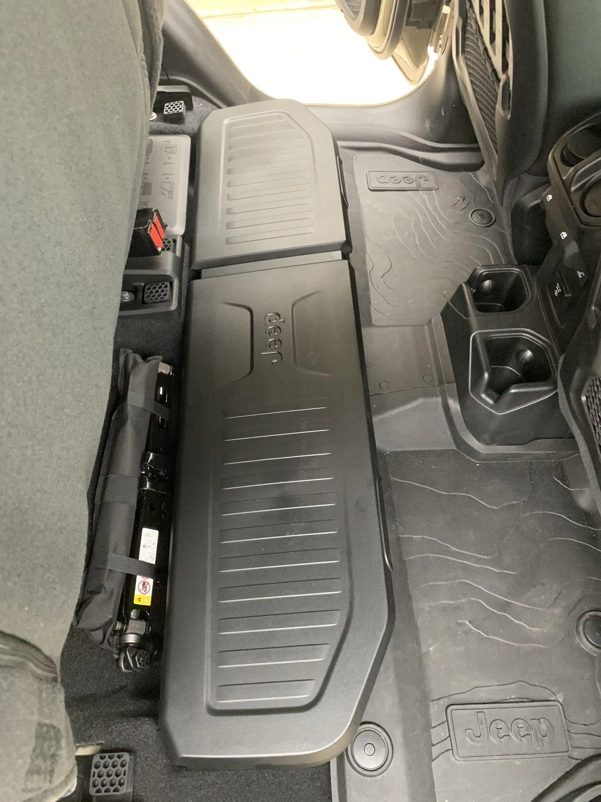 Jeep Gladiator New OEM under seat storage box. E967523A-978B-4A6A-9264-2AB3BAA30DC2