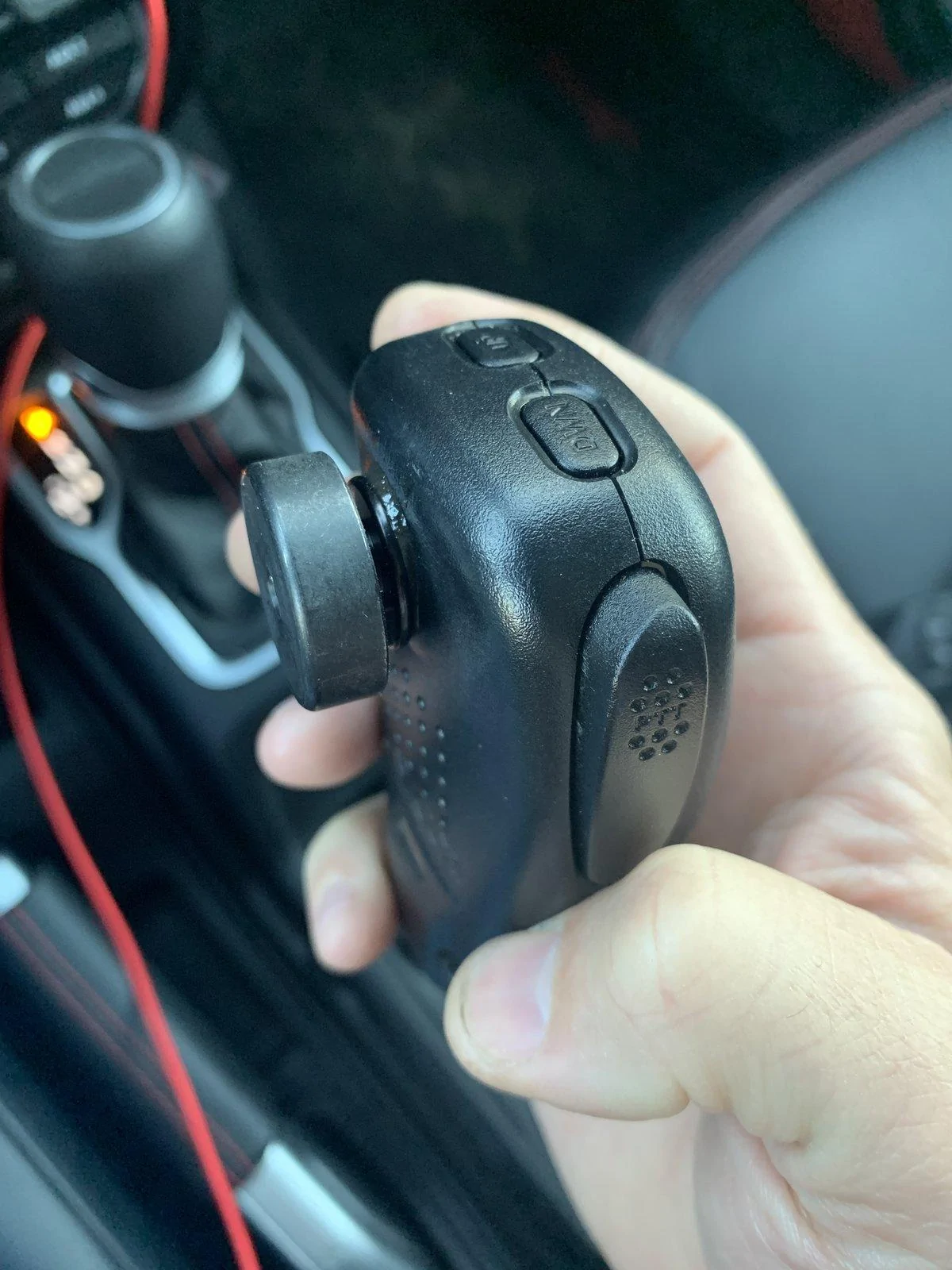 Jeep Gladiator How do I get a CB/HAM microphone mounted here?  Has anyone drilled it? IMG_2883