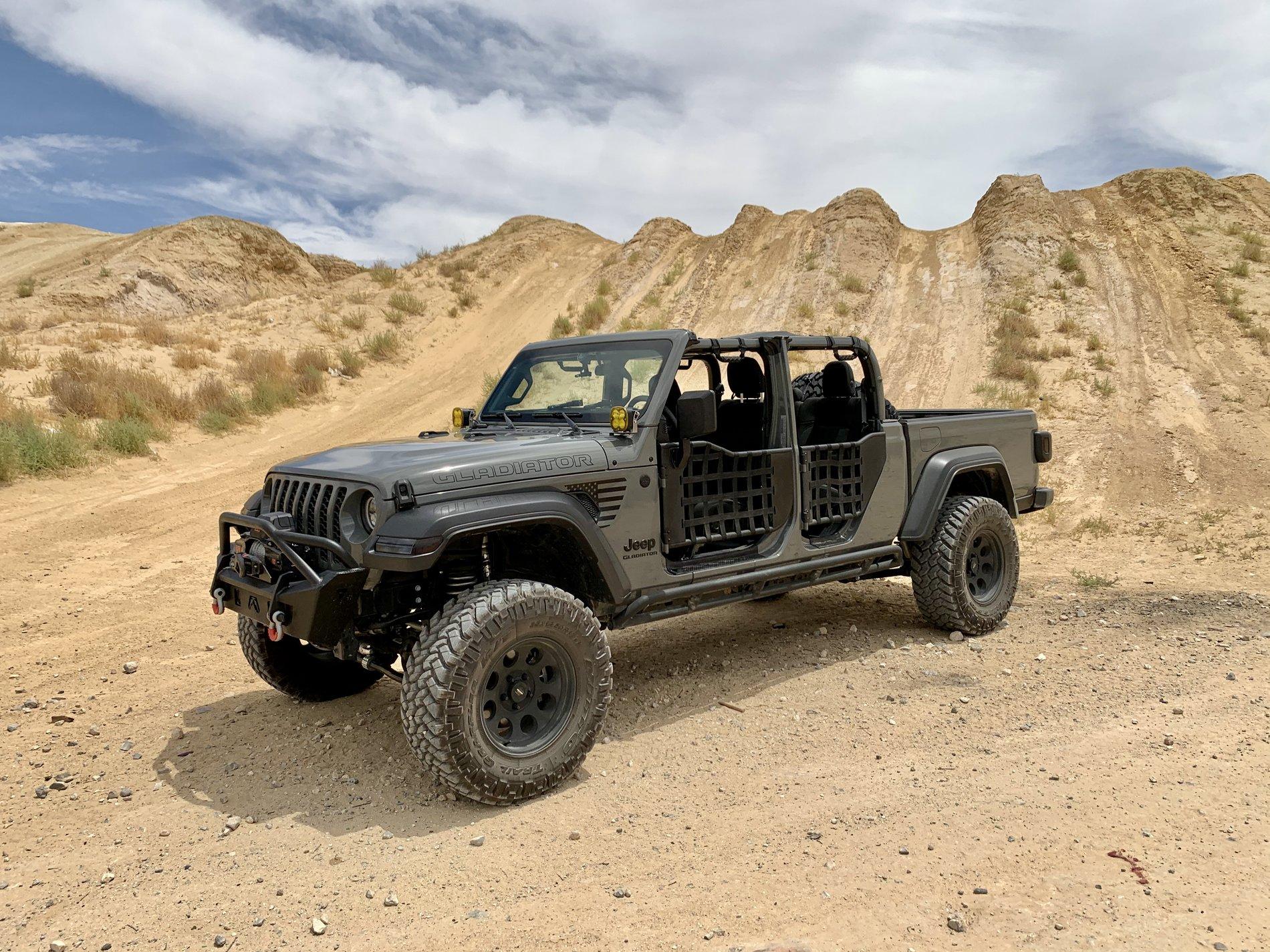 Jeep Gladiator Lets see all those Gladiators with lifts and bigger tires! CCCD584F-5E54-4AD6-9D00-740F9199C537