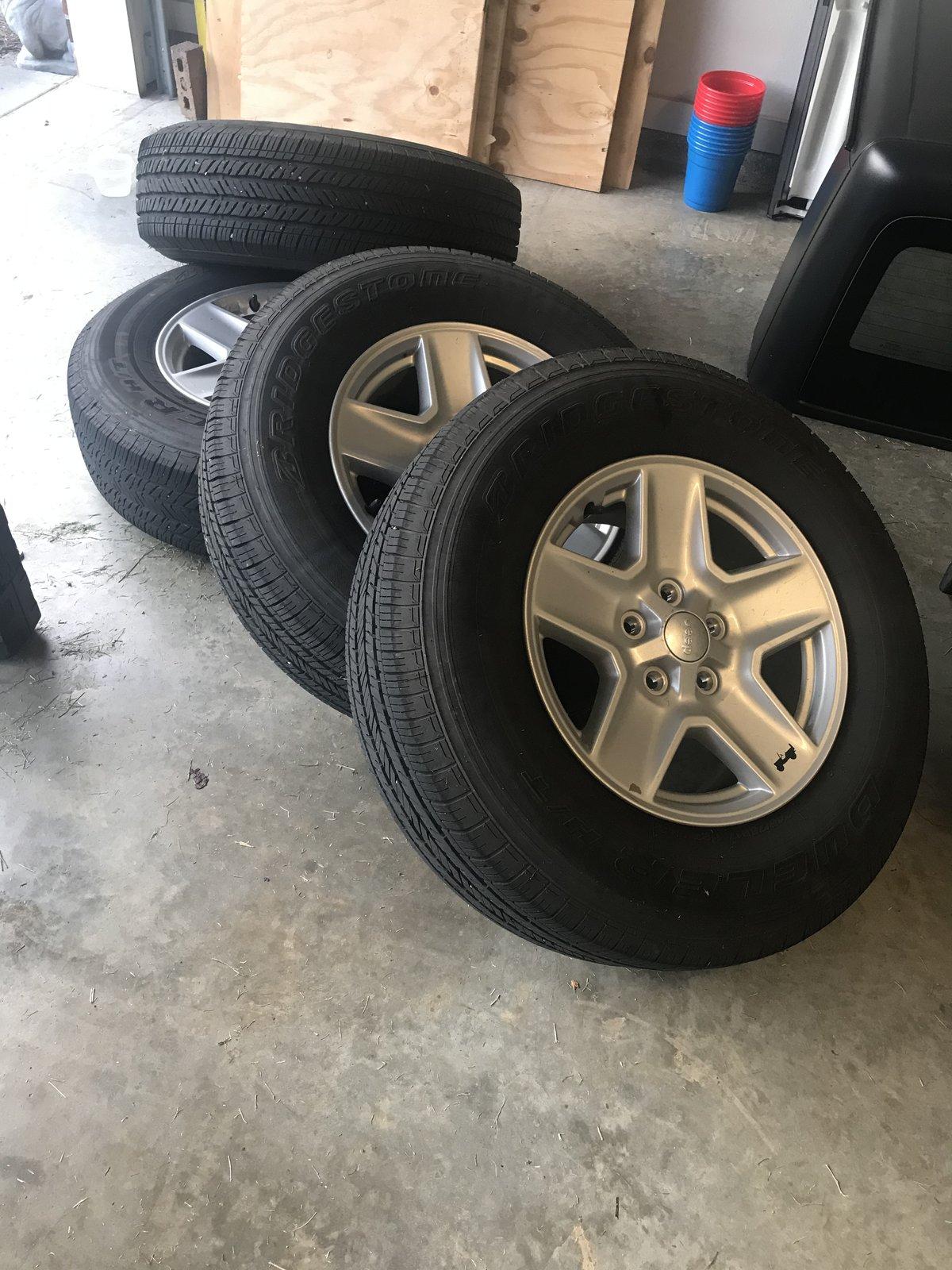 Jeep Gladiator JL Rubi sliders and stock wheels and tires. Photo Jul 11, 7 53 45 PM
