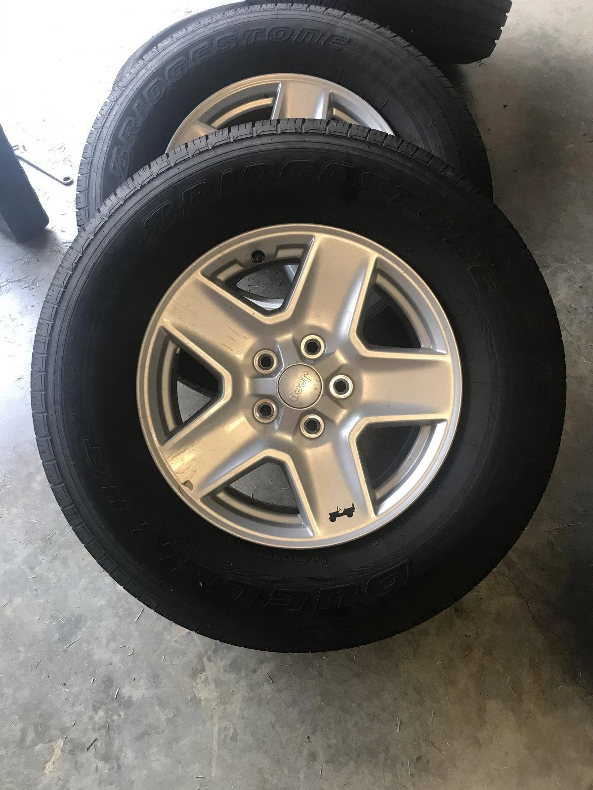Jeep Gladiator JL Rubi sliders and stock wheels and tires. Photo Jul 11, 7 53 49 PM