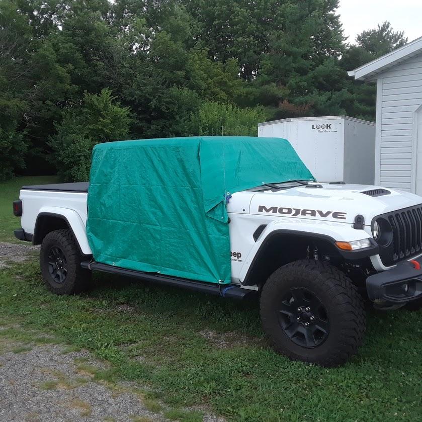 Jeep Gladiator Field expedient cab rain cover: $10, a box cutter, 4 stretch cords mojave cab cover