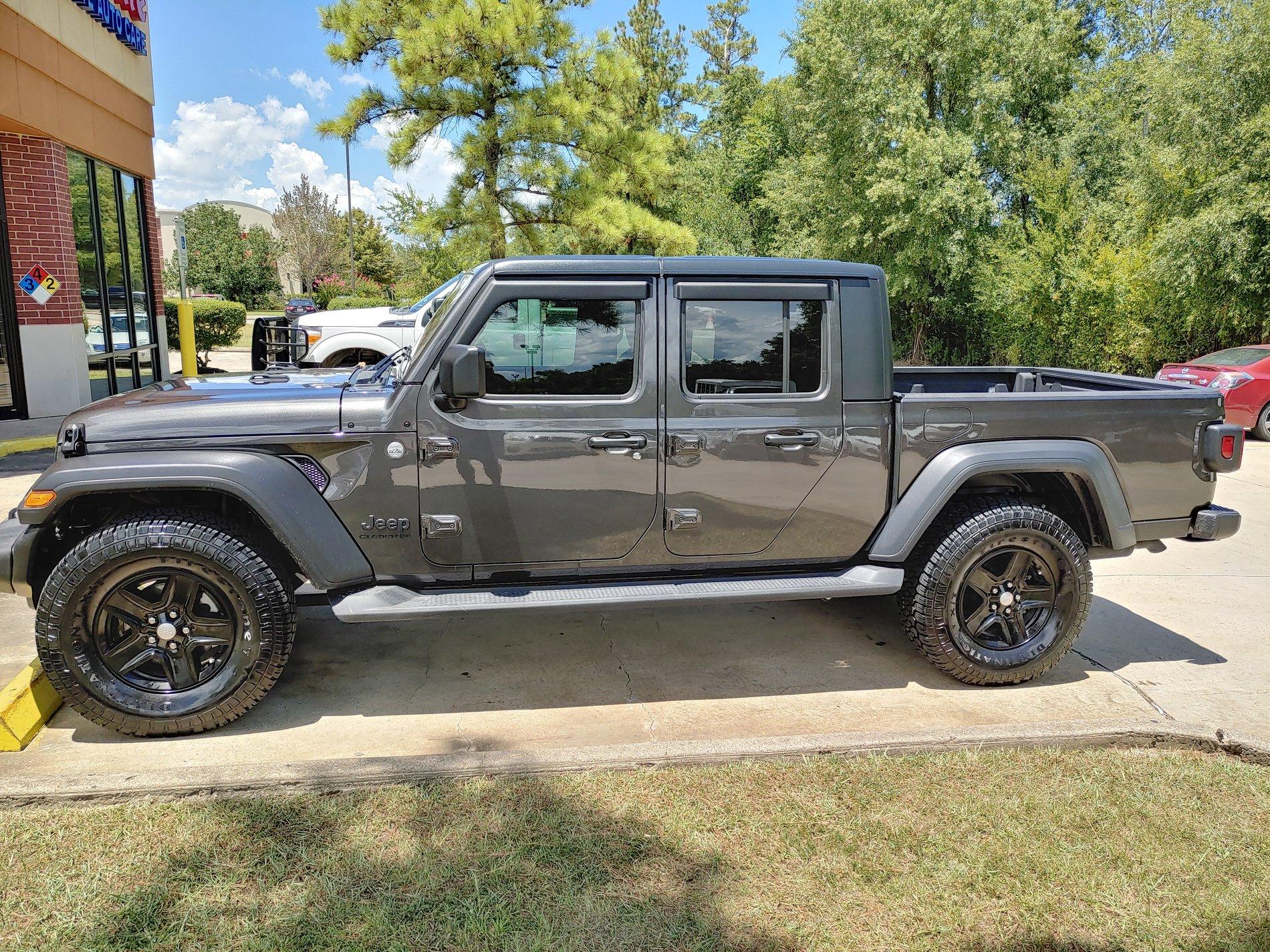 Jeep Gladiator Sport S with bigger tires, side steps, stubby bumper, window rain guards. 20200719_140835_HDR