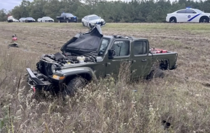 Stolen JT in Arkansas dashcam police footage, pit maneuver, rollover, ejection, yikes