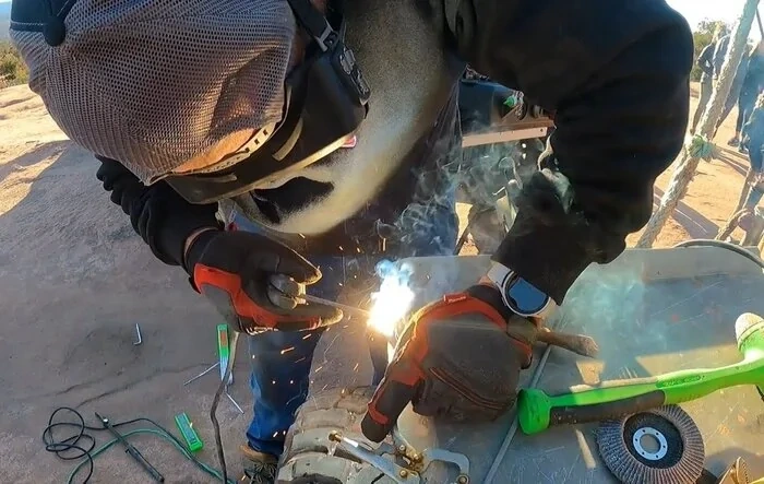 Rory (TrailMater) fixing a broken Jeep Gladiator knuckle on the trail
