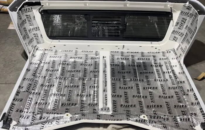 Coverking headliner installed with sound deadening material. Lowered sound decibels in cabin significantly