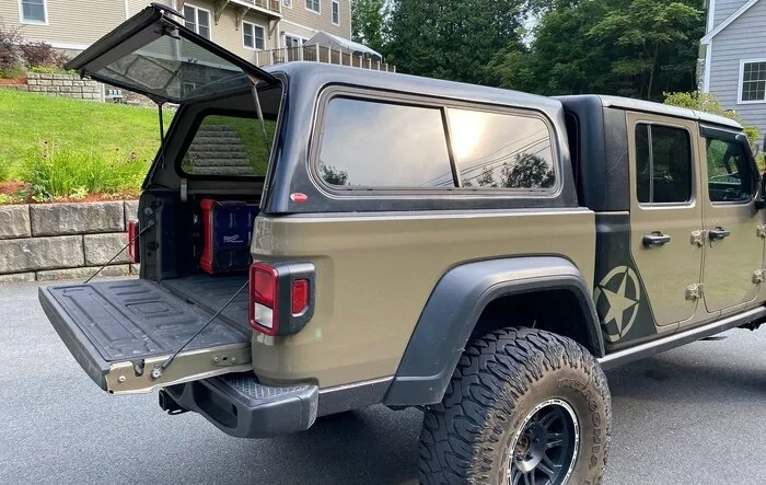 First gen Tacoma bed cap fits on Gladiator
